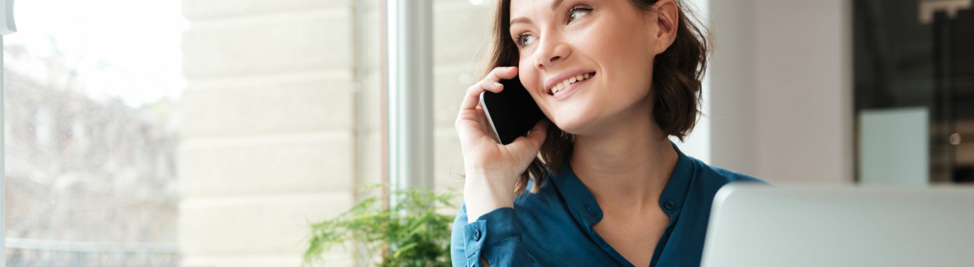 Image of a woman using a phone